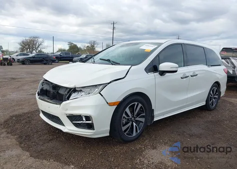 2018 Honda Odyssey Elite z USA, uszkodzony, nr VIN 5FNRL6H93JB050043